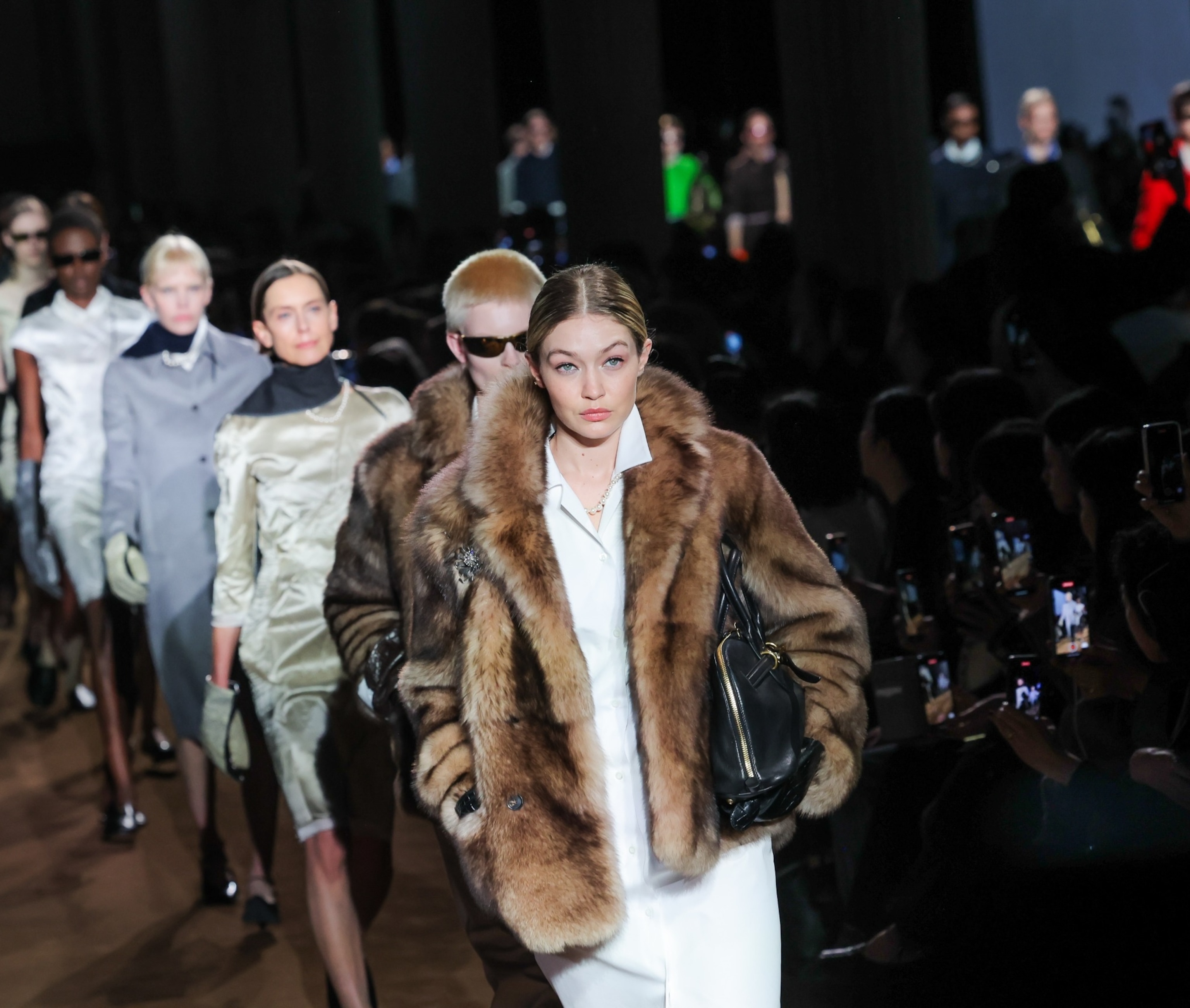 Gigi Hadid struts on the runway at Chanel and Miu Miu during Paris Fashion Week