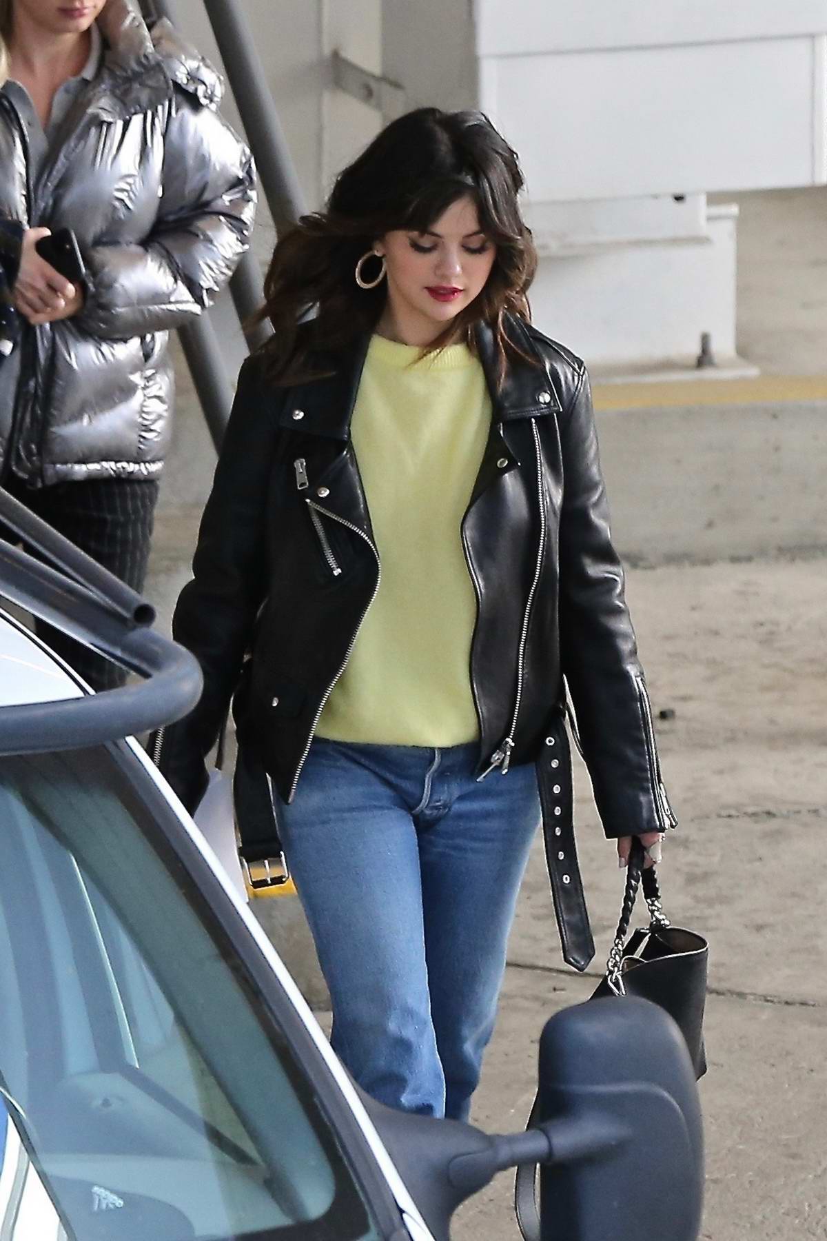 Selena Gomez rocks black leather jacket while out checking new office space with friends in Los Angeles