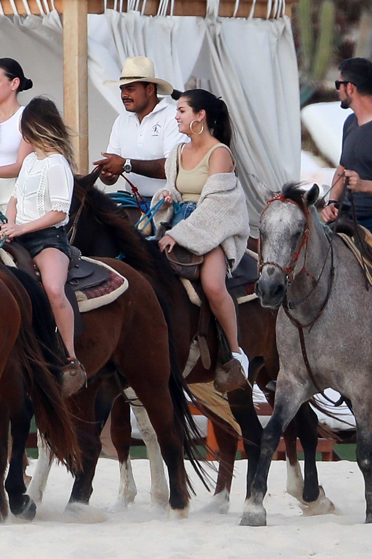 Selena Gomez enjoys some horse riding at the beach with friends in Cabo San Lucas, Mexico