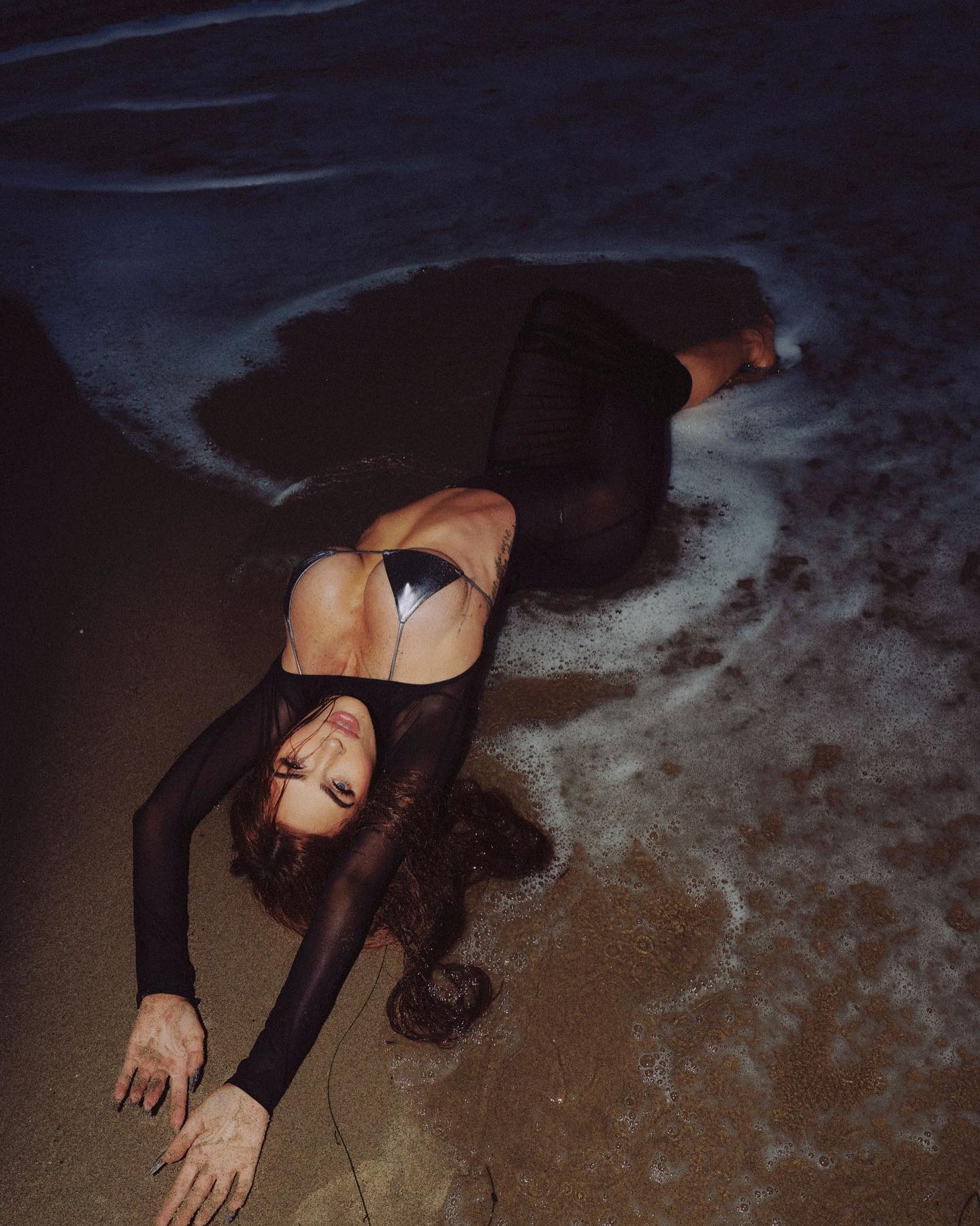 Megan Fox beach photoshoot in sheer dress.