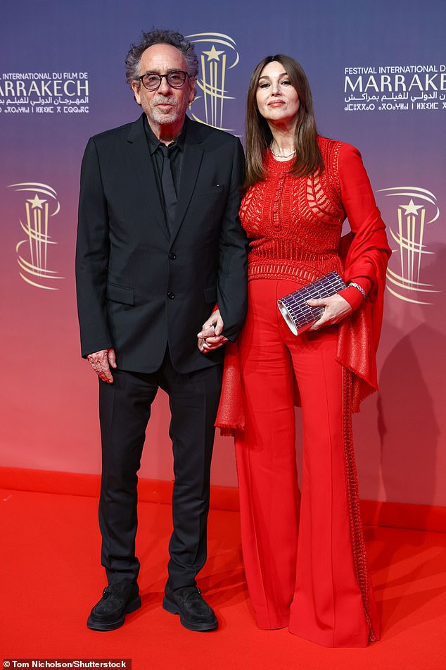 Monica Bellucci in a red jumpsuit attend the Marrakech International Film Festival