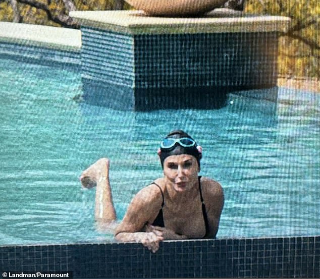 Moore made a splash as she modeled a black swimsuit by Gooseberry Intimates while in her swimming pool in her Texas mega mansion